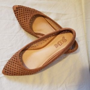 Brash tan flats
